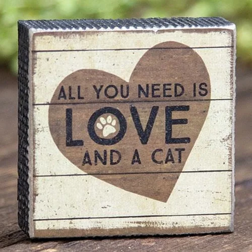 Bed skirts with a retro - style patternLove and a Cat Box Sign